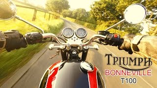 Triumph Bonneville T100 with Dunstall Exhaust  PURE SOUND [upl. by Ayikur]